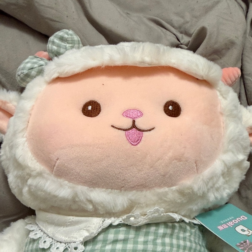 Adorable White and Green Stuffed Animal